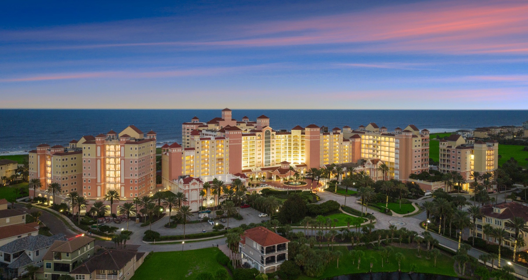 Hammock Dunes towers with the ocean and evening sky